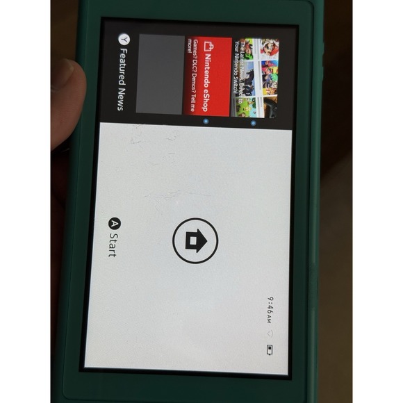 Nintendo Switch Lite review: Portable gaming at its finest  Nintendo Switch Lite- Turquoise  With Charger‎ , Works Good